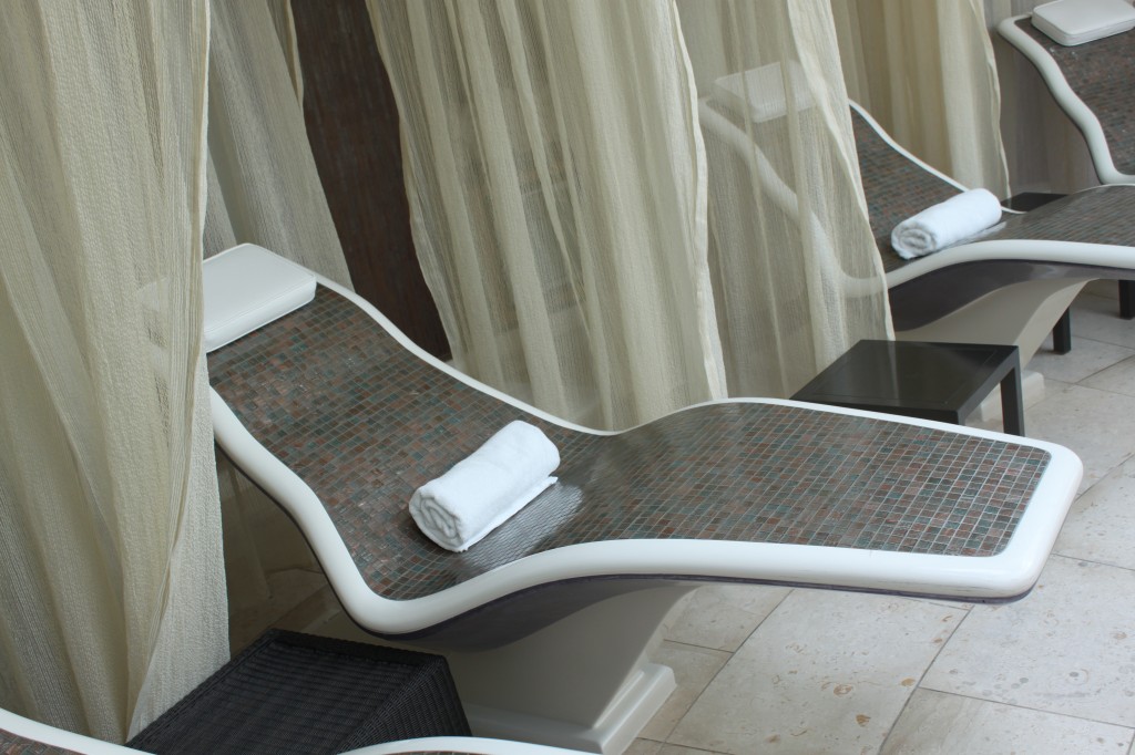 Heated sun beds in the spa on the outside deck